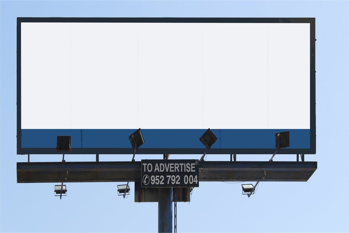 Blank billboard against a blue sky - blank template