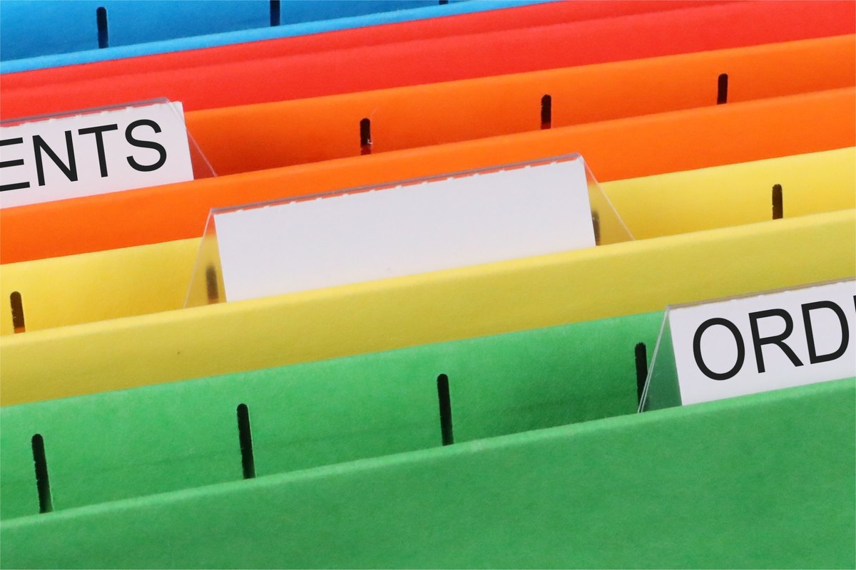Colourful files with a blank tab - blank template