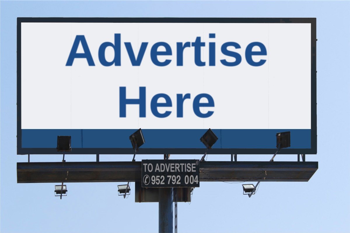 Blank billboard against a blue sky template with the words "Advertise Here" printed on the surface