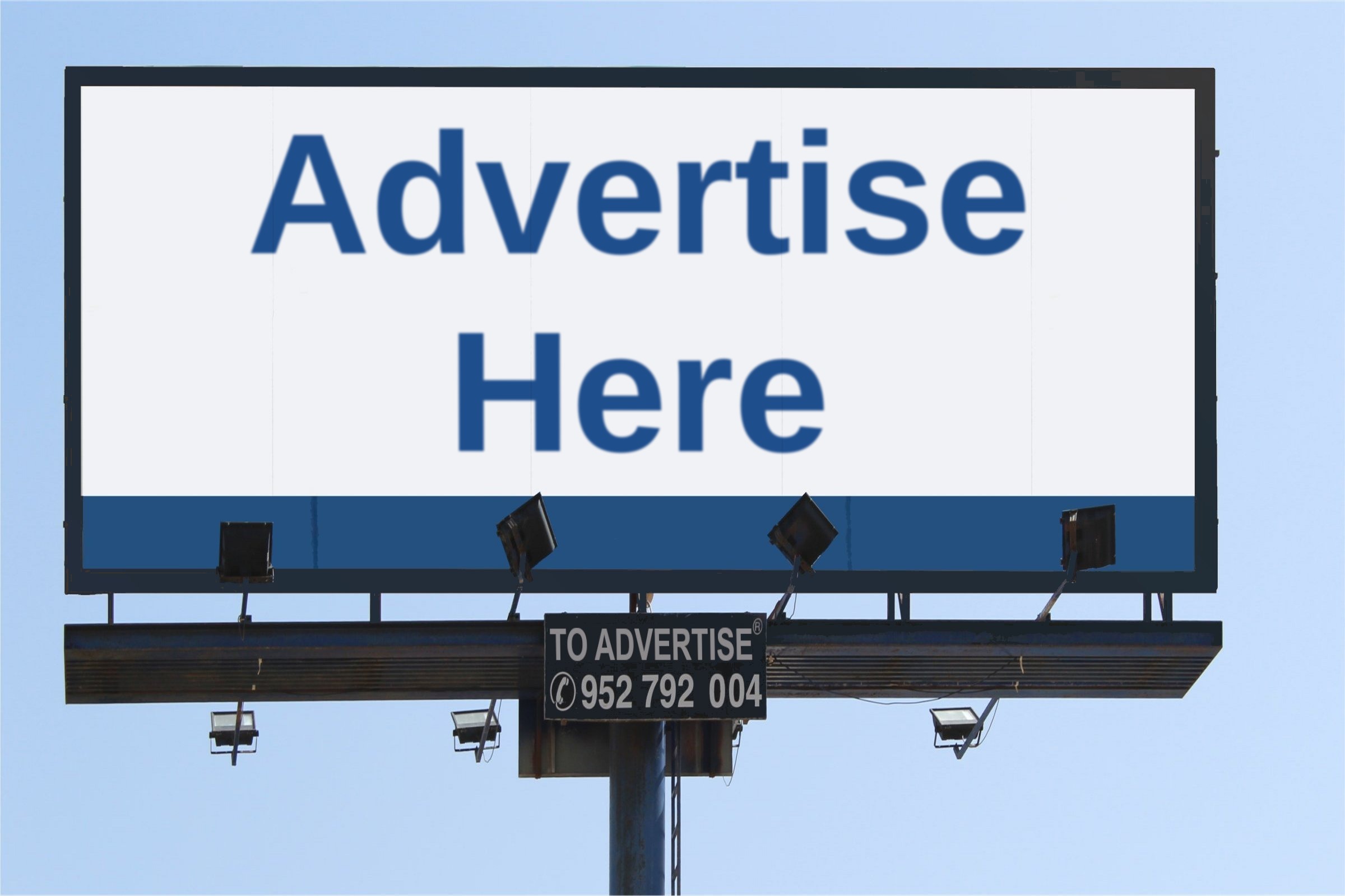 Blank billboard against a blue sky template with the words "Advertise Here" printed on the surface