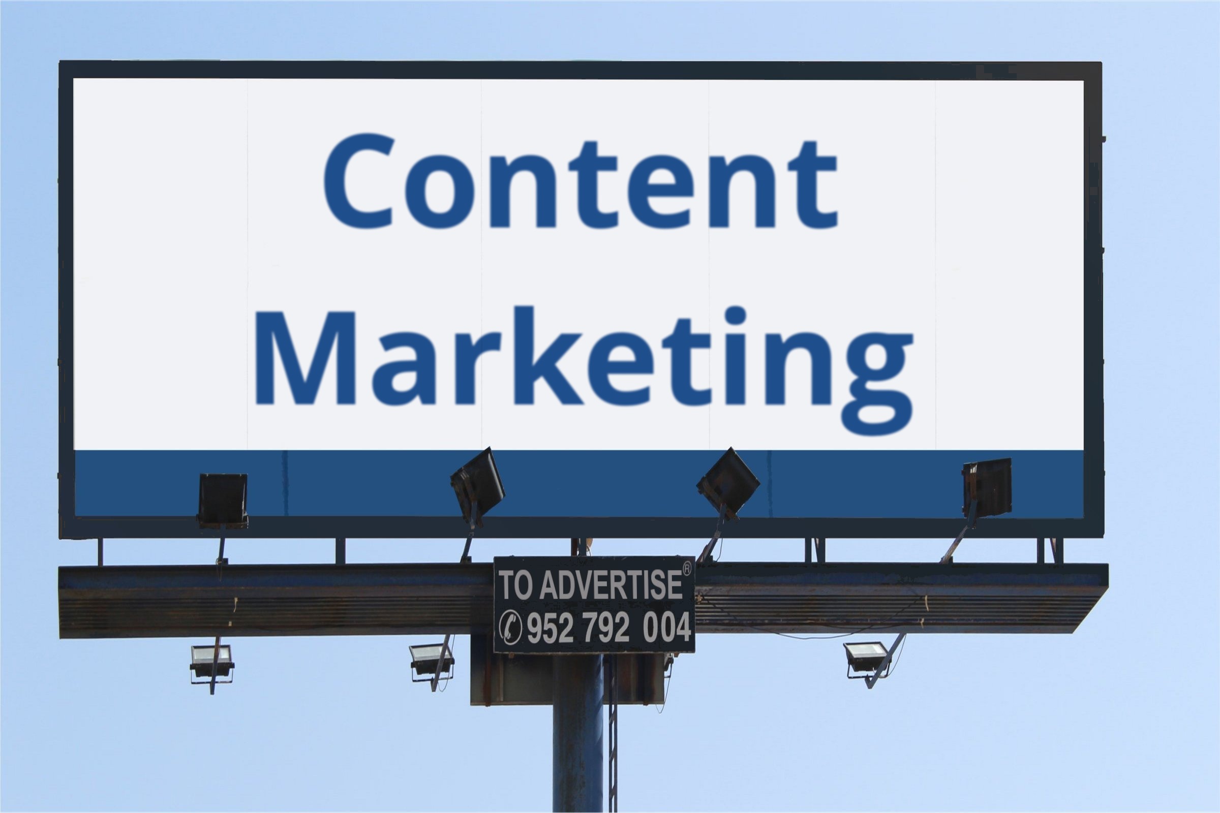Blank billboard against a blue sky template with the words "Content Marketing" printed on the surface
